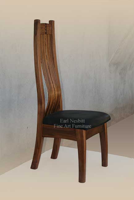 custom made walnut dining room chair showing curve of zebrawood slats